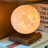 Lunara Moon Lamp warm glow on bookshelf